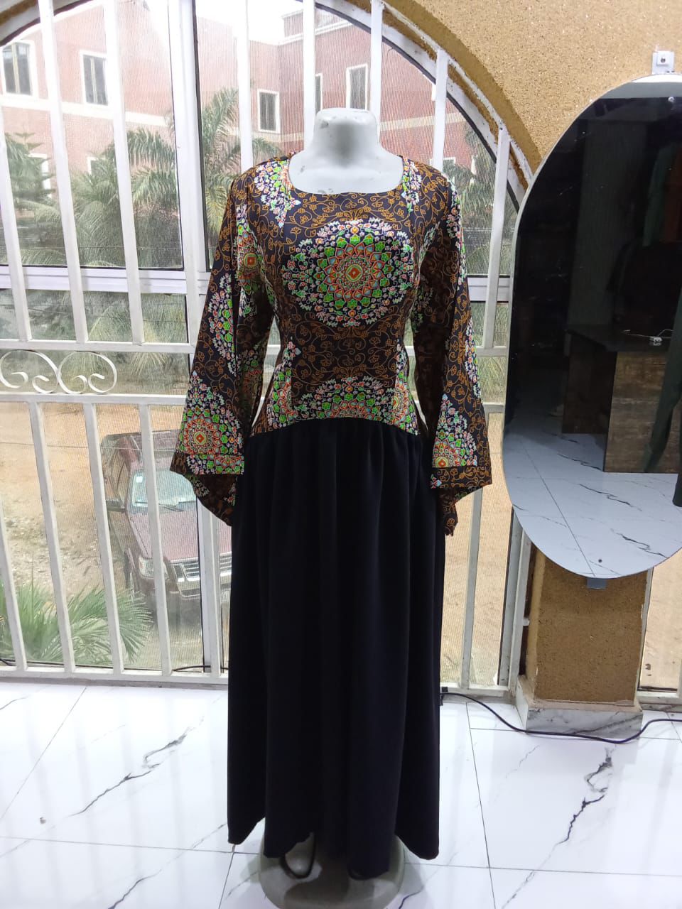 Multicolour Ankara mandala top with black skirt